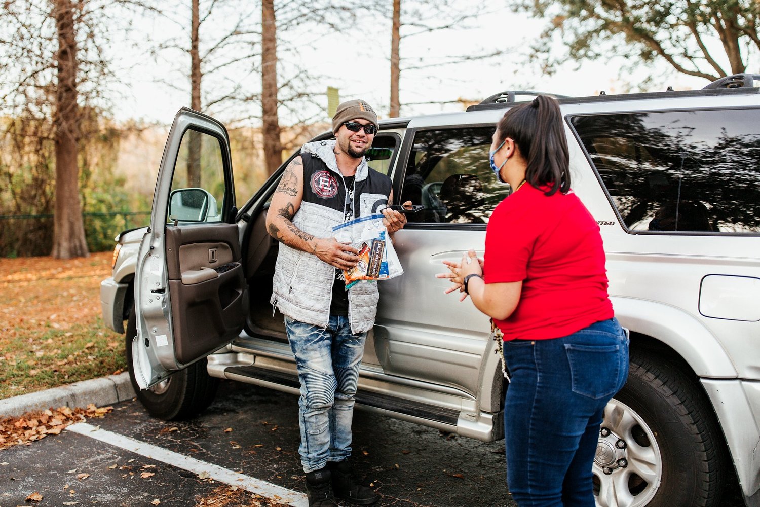 Volunteers serving together at an Action Church outreach event