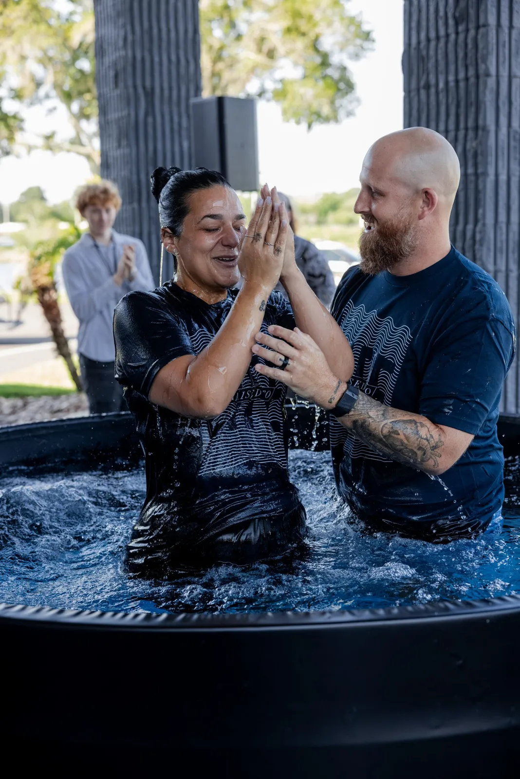 Celebrating a baptism at Action Church