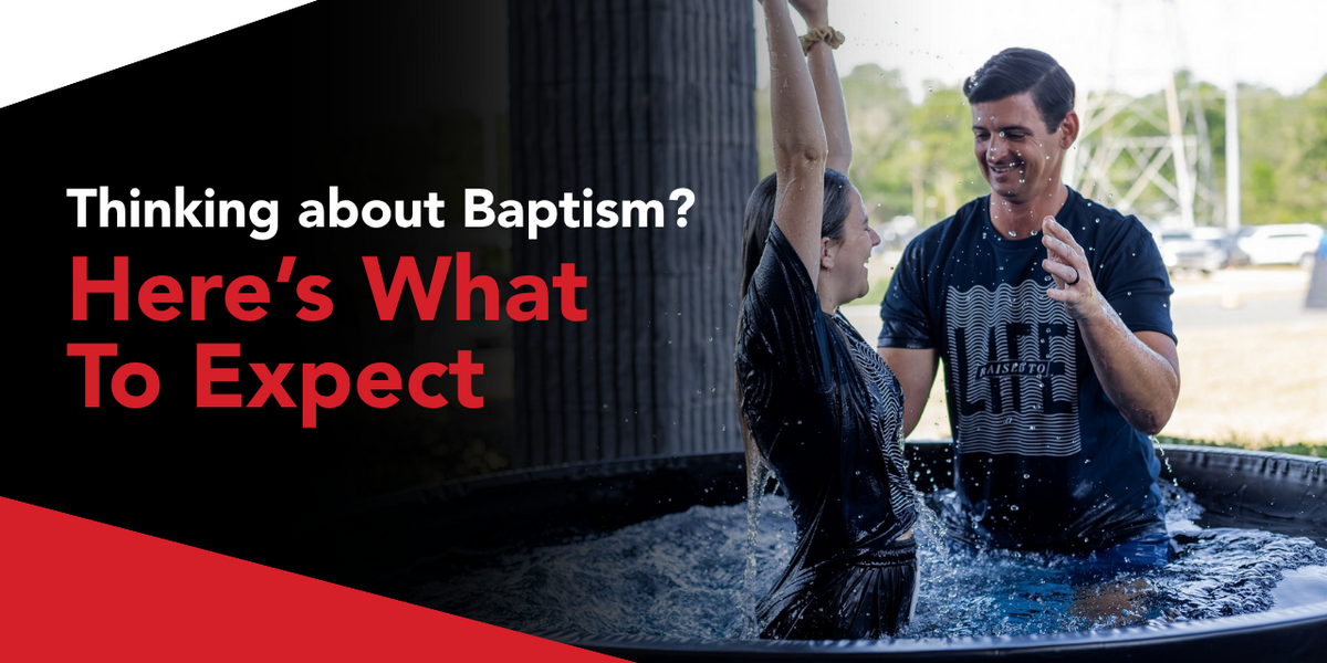Someone celebrating their baptism during a weekend service at Action Church.
