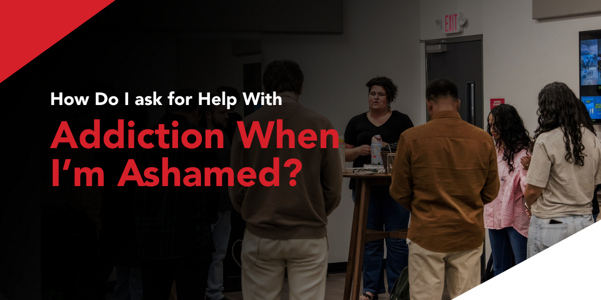 A person having a private, supportive conversation with another adult while seeking help during a difficult season.